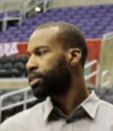 Baron Davis standing inside an arena
