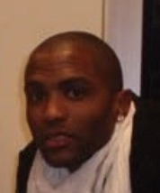 Cuttino Mobley looking toward the camera at an indoor event