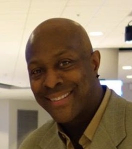 Gary Grant smiling toward the camera