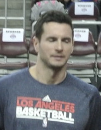 J.J. Redick standing courtside in a Los Angeles Basketball warmup shirt
