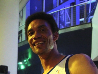 Keith Closs smiling in a Clippers jersey